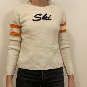 100% Cashmere sweater with Ski writing. Size S